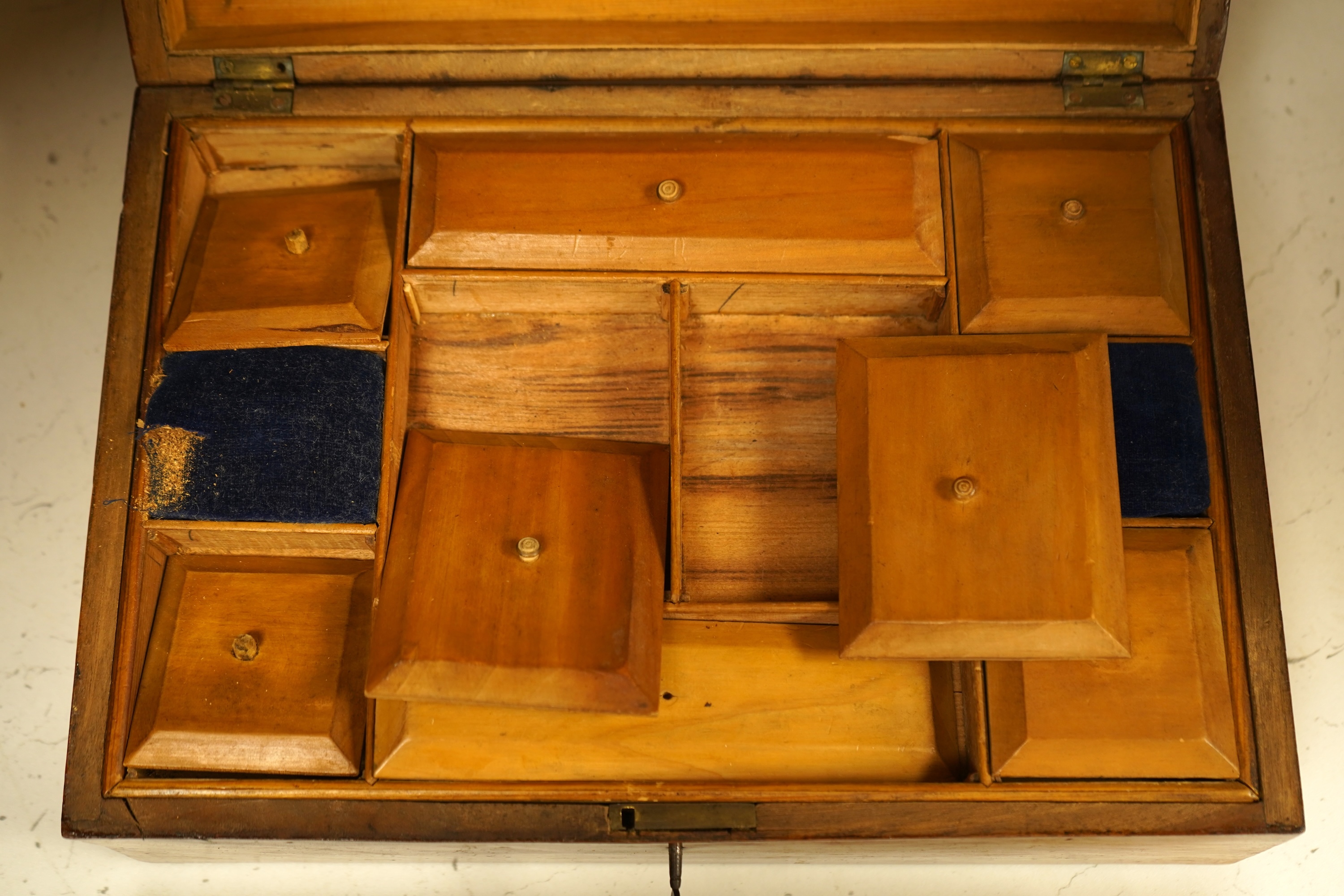 A 19th century Colonial marquetry work box, with key and an oak desk stand, 32cm wide